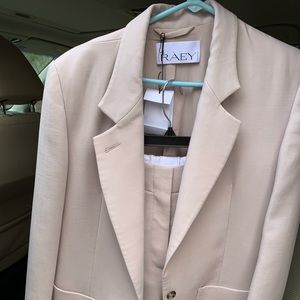 RAEY would blend and silk blazer and shorts suit